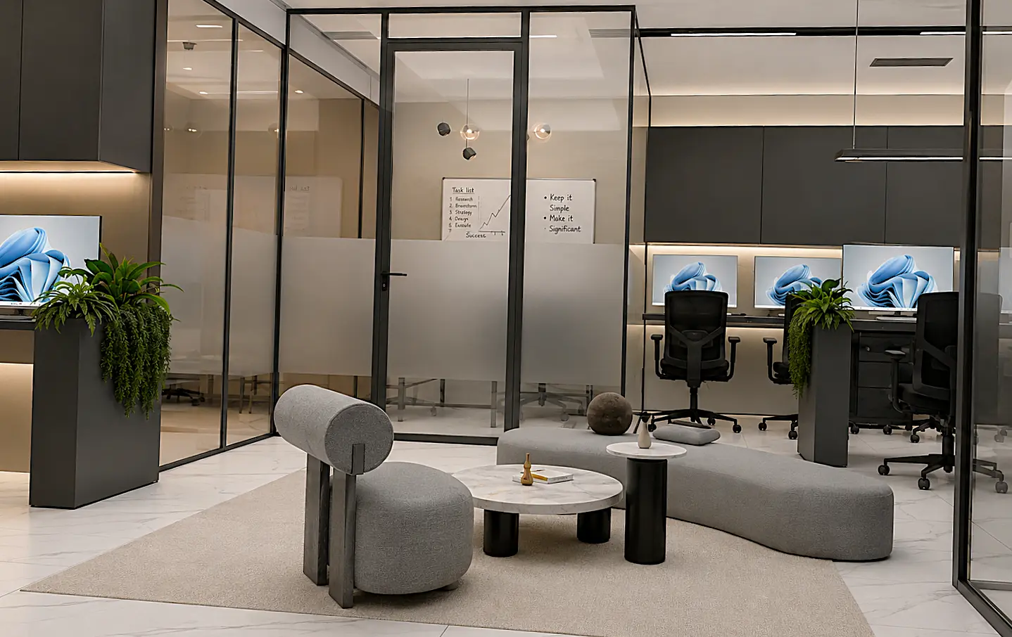 Office lounge seating beside glass meeting rooms and workstations